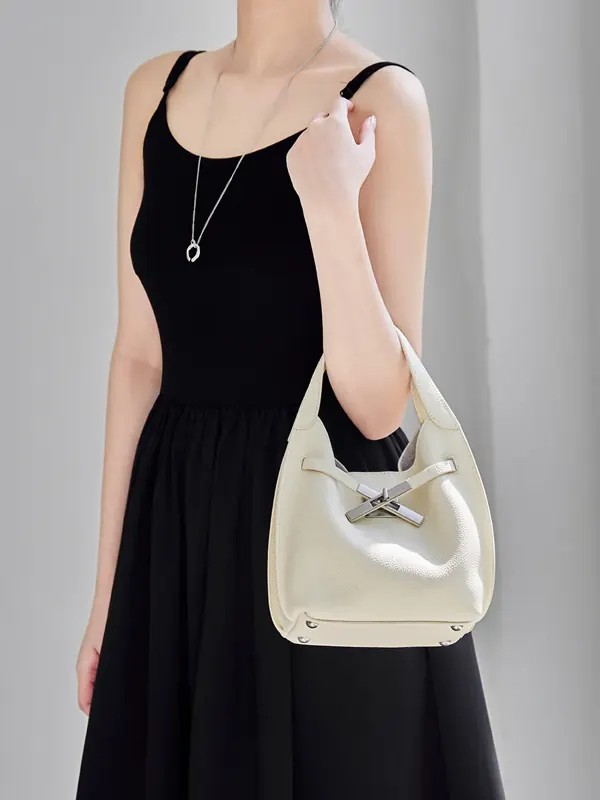 Cartera Junco de cuero vacuno tejido